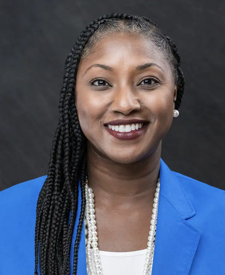Professional portrait of Stacey Wilson, Ed.D., at EPI Center event.