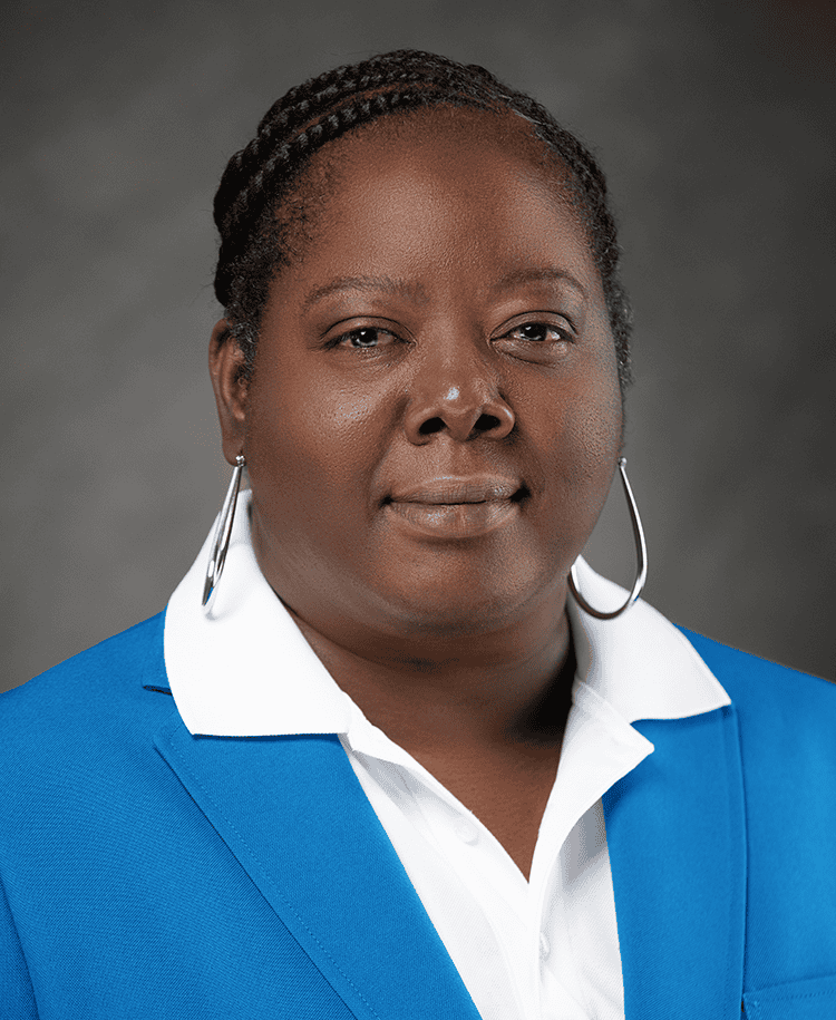 Angela Woodard at EPI Center, professional portrait for leadership profile.